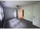 Spacious bedroom features a ceiling fan and neutral carpet at 917 N Rural St, Indianapolis, IN 46201