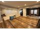 Large living area with refinished hardwood flooring and neutral paint at 917 N Rural St, Indianapolis, IN 46201