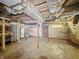 Spacious unfinished basement with exposed ductwork and utilities at 1011 W 7Th St, Anderson, IN 46016