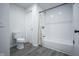Bright bathroom features a shower-tub combination, and new flooring at 1015 Fox Hill Dr, Indianapolis, IN 46228