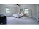 Bright bedroom with natural light and modern decor, offering a comfortable and inviting atmosphere for rest at 1015 Fox Hill Dr, Indianapolis, IN 46228
