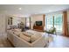 Inviting living room with large windows, stylish furniture, and an open layout perfect for entertaining at 1015 Fox Hill Dr, Indianapolis, IN 46228