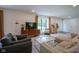 Comfortable living area with a view of the entryway, complete with modern decor and ample seating at 1015 Fox Hill Dr, Indianapolis, IN 46228