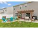 Backyard patio features a pergola, bar, fire pit and seating for outdoor gatherings at 10334 Deercrest Ln, Indianapolis, IN 46239