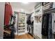 Organized walk-in closet with shelving and hanging space for ample storage at 10707 Burning Ridge Ln, Fishers, IN 46037