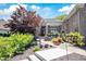 Beautiful home featuring a meticulously landscaped front yard with a covered entrance at 10707 Burning Ridge Ln, Fishers, IN 46037