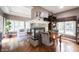 Cozy living space with a fireplace, large windows, and ample seating for Gathering and guests at 10707 Burning Ridge Ln, Fishers, IN 46037