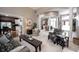 Expansive living space showcasing open layout, stylish furnishings, and neutral decor at 10707 Burning Ridge Ln, Fishers, IN 46037