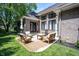 Relaxing patio area with comfortable seating, perfect for outdoor entertaining and relaxation at 10707 Burning Ridge Ln, Fishers, IN 46037