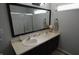 Bathroom with double sink vanity, shower and light gray walls at 12389 Titans Dr, Fishers, IN 46037