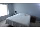 Bedroom featuring large bed, two side tables, and bright window at 12389 Titans Dr, Fishers, IN 46037