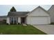 Charming single-Gathering home with a well-manicured lawn and attached two-car garage at 12389 Titans Dr, Fishers, IN 46037