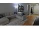 Comfortable living room with a large sectional sofa, area rug, and neutral decor at 12389 Titans Dr, Fishers, IN 46037