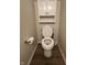 Compact bathroom featuring a toilet and a cabinet for extra storage space at 12639 Justice Xing, Fishers, IN 46037