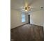 Bedroom with neutral walls, carpeting, ceiling fan, and large window at 12639 Justice Xing, Fishers, IN 46037