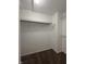 Walk-in closet featuring neutral walls, carpeting, and shelving at 12639 Justice Xing, Fishers, IN 46037