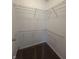 An empty walk-in closet with white walls and wire shelving for organized storage solutions at 12639 Justice Xing, Fishers, IN 46037