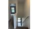 View of the entryway stairs from the upper floor hallway at 12639 Justice Xing, Fishers, IN 46037