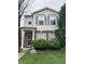 Charming two-story home with a well-manicured lawn and inviting front entrance at 12639 Justice Xing, Fishers, IN 46037
