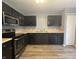 Functional kitchen with sleek black appliances, and ample counter space at 12639 Justice Xing, Fishers, IN 46037