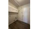 Convenient laundry room with storage cabinets and modern flooring at 12639 Justice Xing, Fishers, IN 46037