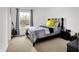 Charming bedroom with a bed, window, guitar, and patterned curtains at 1571 N Creekwater Pass, Greenfield, IN 46140