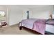 Spacious bedroom with a comfortable bed and connections to an ensuite bathroom at 1571 N Creekwater Pass, Greenfield, IN 46140