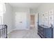 Bright bedroom featuring neutral walls, carpet, closet, and decorative animal wall art at 16067 Meadow Frost Ct, Fishers, IN 46037