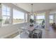Dining area features sliding glass doors to the patio, and backyard views at 16067 Meadow Frost Ct, Fishers, IN 46037