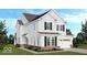 Charming two-story home showcasing white siding, black shutters, and a well-manicured lawn at 16067 Meadow Frost Ct, Fishers, IN 46037