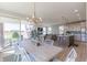 Open-concept layout with a dining area, kitchen and living room; ideal for modern living at 16067 Meadow Frost Ct, Fishers, IN 46037