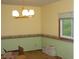 Traditional dining room with view to backyard at 1808 Orchid Ct, Indianapolis, IN 46219