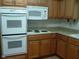Bright kitchen featuring stainless steel appliances and ample cabinetry at 1808 Orchid Ct, Indianapolis, IN 46219