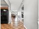 Inviting entryway featuring tile floors, leading to the living area with hardwood floors and ample natural light at 19489 Prairie Crossing Dr, Noblesville, IN 46062