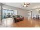 Spacious living room with hardwood floors, and easy access to the sunroom at 19489 Prairie Crossing Dr, Noblesville, IN 46062
