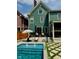 Gorgeous pool area with stylish seating and a well-manicured lawn at 2050 N Alabama St, Indianapolis, IN 46202