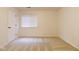 A bedroom with carpet flooring, a window, and neutral-painted walls at 209 Faulkner Ct # 102, Carmel, IN 46032