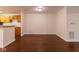 The living room has a smooth surface floor and natural lighting at 209 Faulkner Ct # 102, Carmel, IN 46032