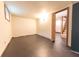 Spacious unfinished basement with an open doorway, concrete floor, and natural light from a small window at 2249 Maple St, Columbus, IN 47201