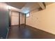 Unfinished basement with exposed closet framing and painted block walls ready for finishing at 2249 Maple St, Columbus, IN 47201