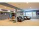 Spacious finished basement featuring a recreational area with seating, ping pong table and a putting green at 23119 Sonoma Ln, Cicero, IN 46034