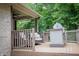 Outdoor deck area with comfortable seating, a grill, and a ceiling fan at 23119 Sonoma Ln, Cicero, IN 46034