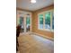 Dining area featuring tile floors and outdoor views at 23119 Sonoma Ln, Cicero, IN 46034