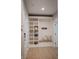 Bright entryway boasts a built-in shelving unit, bench seating and coat hooks at 23119 Sonoma Ln, Cicero, IN 46034