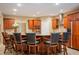 Kitchen with granite countertops, stainless appliances, and a large breakfast bar with seating at 23119 Sonoma Ln, Cicero, IN 46034