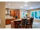 Kitchen with stainless steel appliances, granite counters, and a breakfast bar with seating at 23119 Sonoma Ln, Cicero, IN 46034