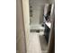 Well-lit bathroom featuring a shower-tub combo and updated vanity at 2412 Mars Hill St, Indianapolis, IN 46241