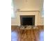 Beautiful fireplace with stone hearth and white mantle at 2631 Mcleay Dr, Indianapolis, IN 46220