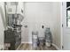 Unfinished basement area featuring HVAC equipment and paint buckets at 360 Richie Ave, Indianapolis, IN 46234