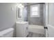 Stylish bathroom with modern vanity, tile flooring, and shower-tub combo at 410 Plum St, Frankton, IN 46044